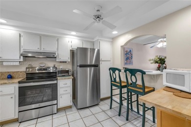 Beautiful 2 bed 2 bath unit in The Palms of Deer Creek located on Deer Creek Golf Club in Florida - for sale on GolfHomes.com, golf home, golf lot