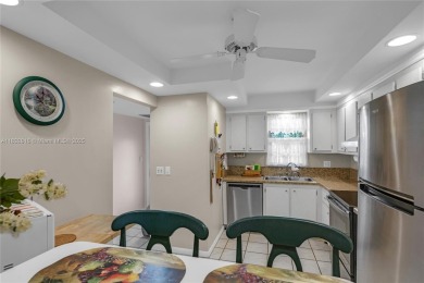 Beautiful 2 bed 2 bath unit in The Palms of Deer Creek located on Deer Creek Golf Club in Florida - for sale on GolfHomes.com, golf home, golf lot