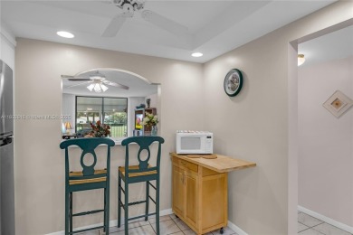 Beautiful 2 bed 2 bath unit in The Palms of Deer Creek located on Deer Creek Golf Club in Florida - for sale on GolfHomes.com, golf home, golf lot