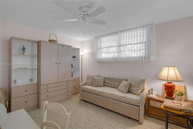 Beautiful 2 bed 2 bath unit in The Palms of Deer Creek located on Deer Creek Golf Club in Florida - for sale on GolfHomes.com, golf home, golf lot