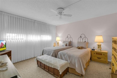 Beautiful 2 bed 2 bath unit in The Palms of Deer Creek located on Deer Creek Golf Club in Florida - for sale on GolfHomes.com, golf home, golf lot