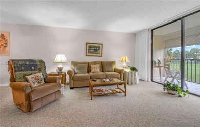 Beautiful 2 bed 2 bath unit in The Palms of Deer Creek located on Deer Creek Golf Club in Florida - for sale on GolfHomes.com, golf home, golf lot