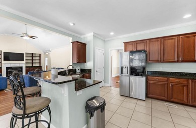 Set along the 10th fairway of the Santee National Golf Club on Santee National Golf Course in South Carolina - for sale on GolfHomes.com, golf home, golf lot