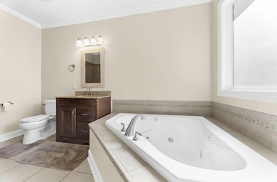 Set along the 10th fairway of the Santee National Golf Club on Santee National Golf Course in South Carolina - for sale on GolfHomes.com, golf home, golf lot