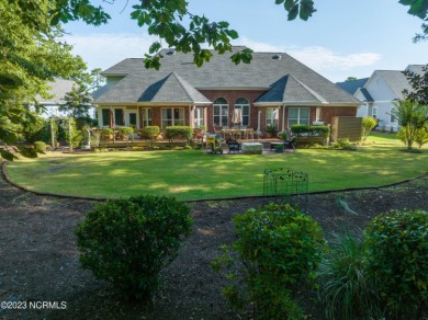Located on a quiet, secluded cul de sac, this beautiful brick on Founders Club At St. James Plantation in North Carolina - for sale on GolfHomes.com, golf home, golf lot