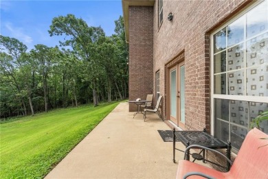 Welcome to your dream home in the highly sought-after Masters on Fayetteville Country Club in Arkansas - for sale on GolfHomes.com, golf home, golf lot