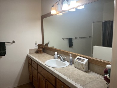 Enter into this lovely home with 3bedrooms, 2 baths, large on Chaparral Golf and Country Club in Arizona - for sale on GolfHomes.com, golf home, golf lot