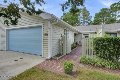 Welcome to low-maintenance living with thoughtful updates and on Inland Greens Golf Course in North Carolina - for sale on GolfHomes.com, golf home, golf lot