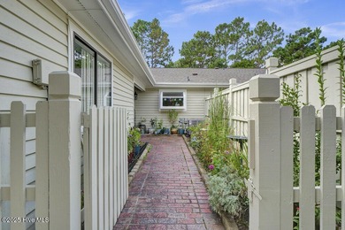 Welcome to low-maintenance living with thoughtful updates and on Inland Greens Golf Course in North Carolina - for sale on GolfHomes.com, golf home, golf lot