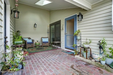 Welcome to low-maintenance living with thoughtful updates and on Inland Greens Golf Course in North Carolina - for sale on GolfHomes.com, golf home, golf lot