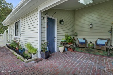 Welcome to low-maintenance living with thoughtful updates and on Inland Greens Golf Course in North Carolina - for sale on GolfHomes.com, golf home, golf lot