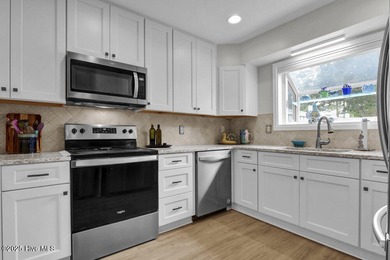 Welcome to low-maintenance living with thoughtful updates and on Inland Greens Golf Course in North Carolina - for sale on GolfHomes.com, golf home, golf lot