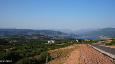 Stunning downhill building lot with magnificent 180 degree views on Talisker Club At Tuhaye in Utah - for sale on GolfHomes.com, golf home, golf lot
