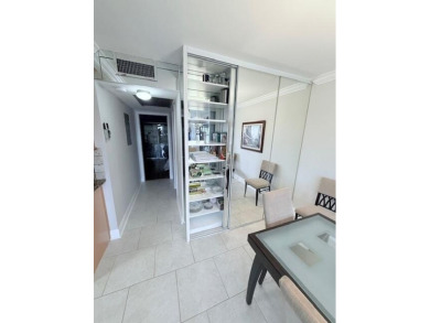 A most desirable waterfront location near pooles beautifully on Hillsboro Pines Golf in Florida - for sale on GolfHomes.com, golf home, golf lot