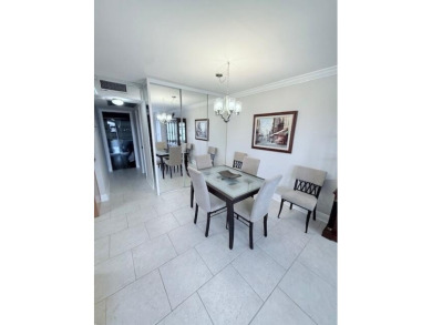 A most desirable waterfront location near pooles beautifully on Hillsboro Pines Golf in Florida - for sale on GolfHomes.com, golf home, golf lot
