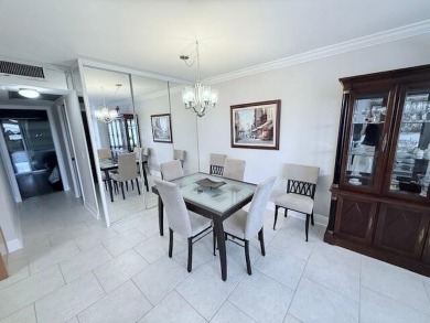 A most desirable waterfront location near pooles beautifully on Hillsboro Pines Golf in Florida - for sale on GolfHomes.com, golf home, golf lot