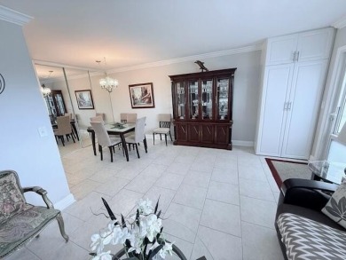 A most desirable waterfront location near pooles beautifully on Hillsboro Pines Golf in Florida - for sale on GolfHomes.com, golf home, golf lot