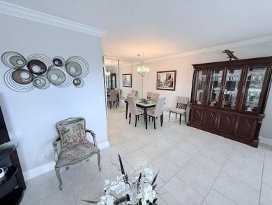 A most desirable waterfront location near pooles beautifully on Hillsboro Pines Golf in Florida - for sale on GolfHomes.com, golf home, golf lot