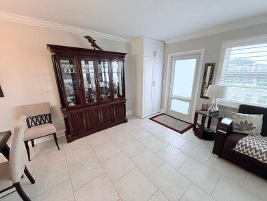 A most desirable waterfront location near pooles beautifully on Hillsboro Pines Golf in Florida - for sale on GolfHomes.com, golf home, golf lot