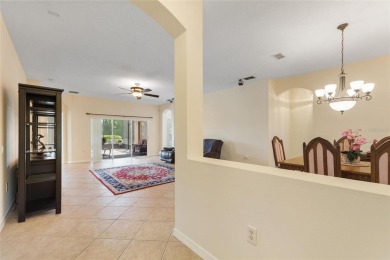 For sale is a charming Melody model nestled in a serene on Stonegate Golf Club in Florida - for sale on GolfHomes.com, golf home, golf lot