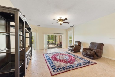 For sale is a charming Melody model nestled in a serene on Stonegate Golf Club in Florida - for sale on GolfHomes.com, golf home, golf lot