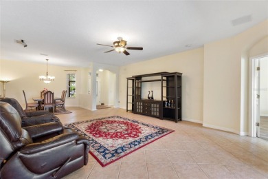 For sale is a charming Melody model nestled in a serene on Stonegate Golf Club in Florida - for sale on GolfHomes.com, golf home, golf lot