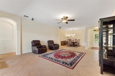 For sale is a charming Melody model nestled in a serene on Stonegate Golf Club in Florida - for sale on GolfHomes.com, golf home, golf lot
