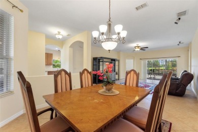 For sale is a charming Melody model nestled in a serene on Stonegate Golf Club in Florida - for sale on GolfHomes.com, golf home, golf lot