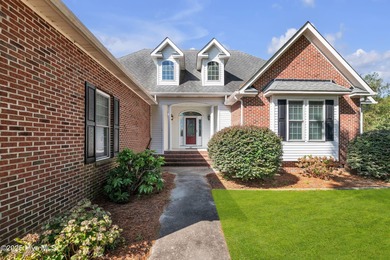 Welcome home! This 3-bedroom, 2.5-bath house sits under a canopy on The Carolina Club in North Carolina - for sale on GolfHomes.com, golf home, golf lot
