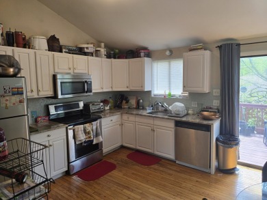 This 4 bedroom, 2 bath split level home sits in an amenity on Pocono Farms Country Club in Pennsylvania - for sale on GolfHomes.com, golf home, golf lot