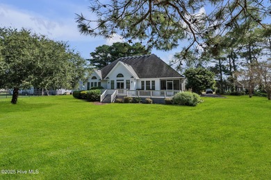 Welcome home! This 3-bedroom, 2.5-bath house sits under a canopy on The Carolina Club in North Carolina - for sale on GolfHomes.com, golf home, golf lot