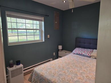 This 4 bedroom, 2 bath split level home sits in an amenity on Pocono Farms Country Club in Pennsylvania - for sale on GolfHomes.com, golf home, golf lot