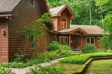 This home reflects a deep appreciation for quality and comfort on Cedar River Golf Course in Michigan - for sale on GolfHomes.com, golf home, golf lot