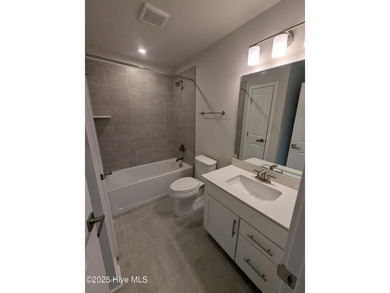 QUICK MOVE IN!! Welcome to Resort Style Living a golf cart ride on Sea Trail Golf Resort in North Carolina - for sale on GolfHomes.com, golf home, golf lot