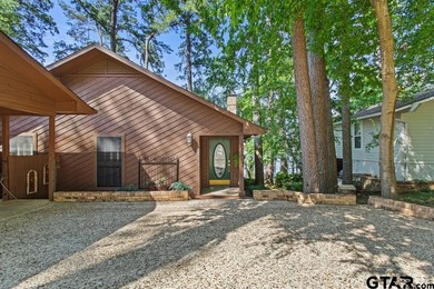 Enjoy breathtaking lake views from nearly every room in this on Hide-A-Way Lake Golf Course in Texas - for sale on GolfHomes.com, golf home, golf lot