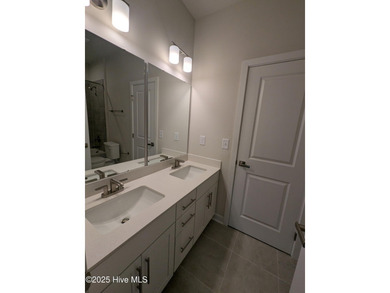 QUICK MOVE IN!! Welcome to Resort Style Living a golf cart ride on Sea Trail Golf Resort in North Carolina - for sale on GolfHomes.com, golf home, golf lot