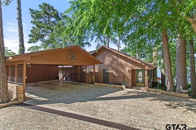 Enjoy breathtaking lake views from nearly every room in this on Hide-A-Way Lake Golf Course in Texas - for sale on GolfHomes.com, golf home, golf lot