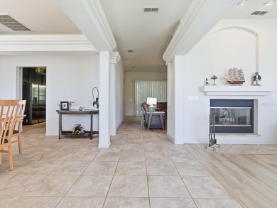 Discover your Florida oasis in this impeccably updated home on Lakes of Lady Lake Golf Course in Florida - for sale on GolfHomes.com, golf home, golf lot