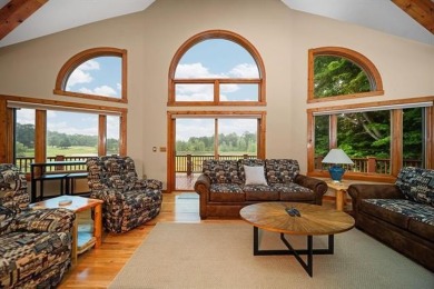 This home reflects a deep appreciation for quality and comfort on Cedar River Golf Course in Michigan - for sale on GolfHomes.com, golf home, golf lot