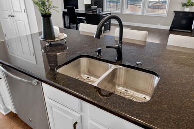 Beautifully maintained one-story home located on the 10th green on The Club at Pine Forest  in South Carolina - for sale on GolfHomes.com, golf home, golf lot