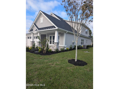 QUICK MOVE IN!! Welcome to Resort Style Living a golf cart ride on Sea Trail Golf Resort in North Carolina - for sale on GolfHomes.com, golf home, golf lot
