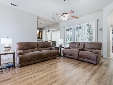 Discover your Florida oasis in this impeccably updated home on Lakes of Lady Lake Golf Course in Florida - for sale on GolfHomes.com, golf home, golf lot