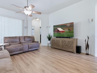Discover your Florida oasis in this impeccably updated home on Lakes of Lady Lake Golf Course in Florida - for sale on GolfHomes.com, golf home, golf lot