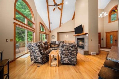 This home reflects a deep appreciation for quality and comfort on Cedar River Golf Course in Michigan - for sale on GolfHomes.com, golf home, golf lot