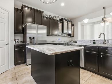 Discover your Florida oasis in this impeccably updated home on Lakes of Lady Lake Golf Course in Florida - for sale on GolfHomes.com, golf home, golf lot
