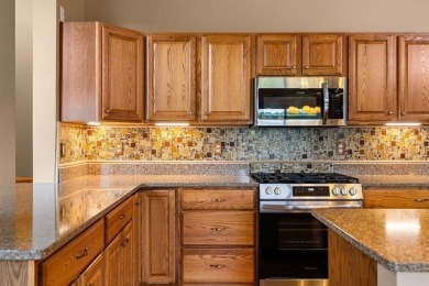 This home reflects a deep appreciation for quality and comfort on Cedar River Golf Course in Michigan - for sale on GolfHomes.com, golf home, golf lot