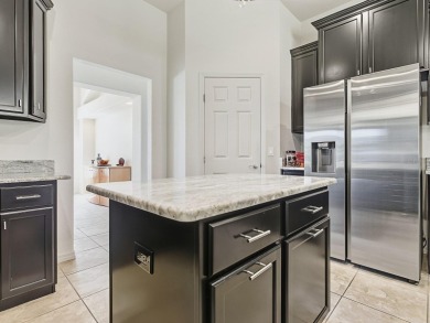 Discover your Florida oasis in this impeccably updated home on Lakes of Lady Lake Golf Course in Florida - for sale on GolfHomes.com, golf home, golf lot