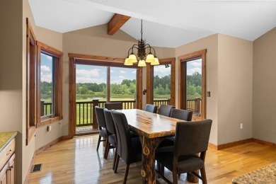 This home reflects a deep appreciation for quality and comfort on Cedar River Golf Course in Michigan - for sale on GolfHomes.com, golf home, golf lot