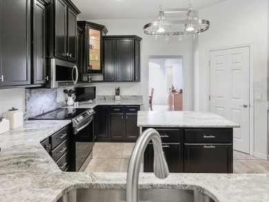 Discover your Florida oasis in this impeccably updated home on Lakes of Lady Lake Golf Course in Florida - for sale on GolfHomes.com, golf home, golf lot