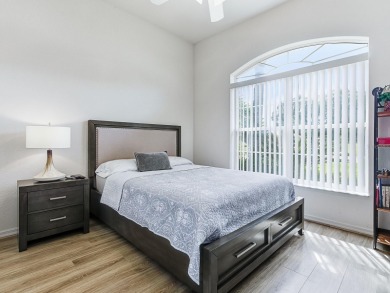 Discover your Florida oasis in this impeccably updated home on Lakes of Lady Lake Golf Course in Florida - for sale on GolfHomes.com, golf home, golf lot